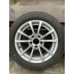 Originele 16” BMW velgen styling 390 met winterbanden