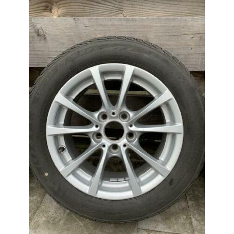 Originele 16” BMW velgen styling 390 met winterbanden