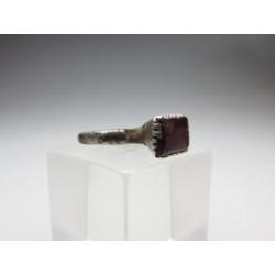 Medieval silver children's ring with garnet inlay