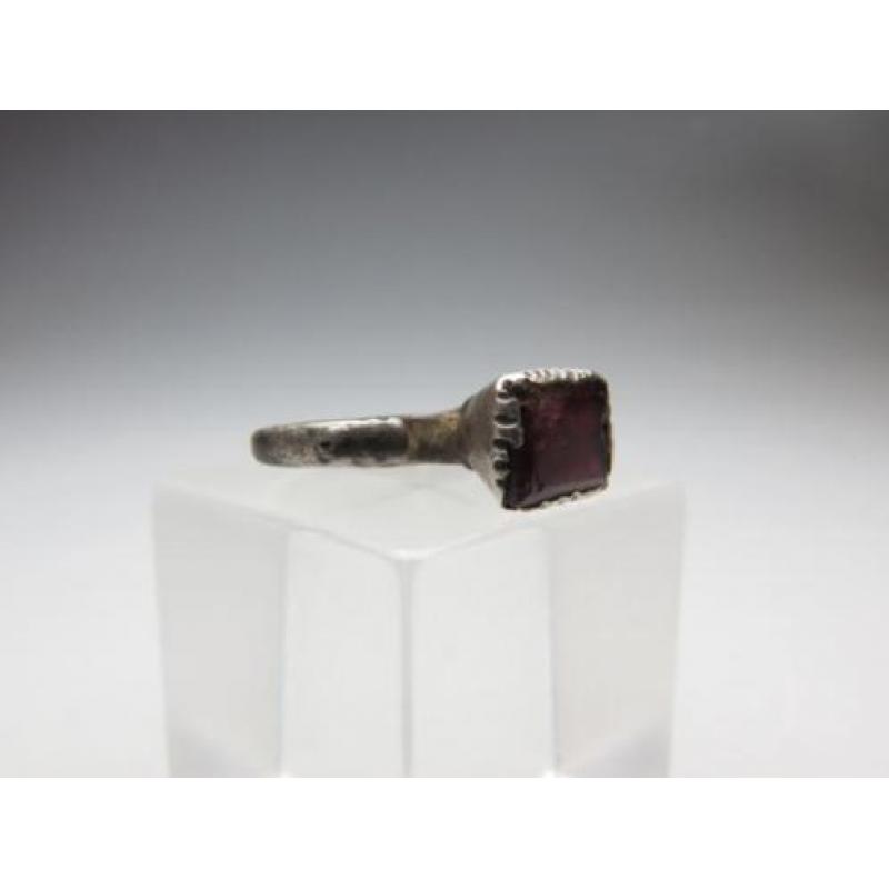 Medieval silver children's ring with garnet inlay