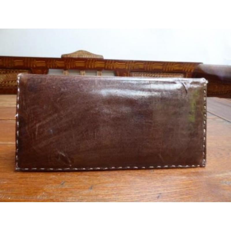 Vintage leren clutch met slangenleren details